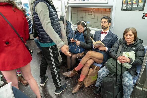 This image is from New York where a man rides the F subway line. It was the 18th annual No Pants subway ride on January 13, 2019 in New York City. (Photo by David 'Dee' Delgado/Getty Images)