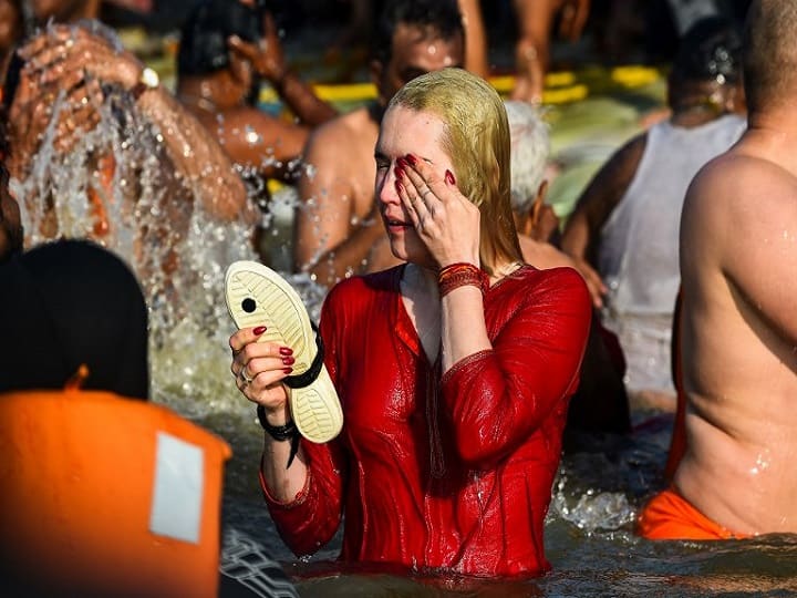 Kumbh Meal 2019: Attracting eye-balls of one and all, especially the foreigners, was the march of Naga sadhus, a martial order of ascetics who move about naked with ash smeared on their whole body. (AFP)