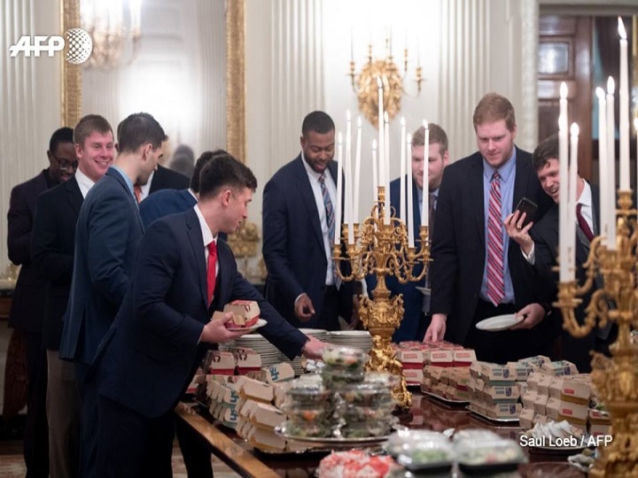 On Monday, the Clemson Tigers were invited by Trump to the White House to celebrate their national championship win over the Alabama Crimson Tide. / AFP IMAGE