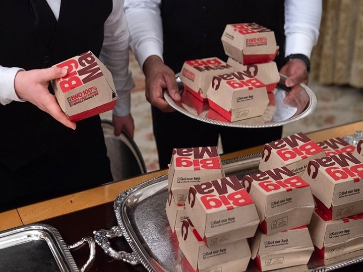 Standing behind the spread of fast food, in the Dining Room of the White House, Trump said he likes them all. 