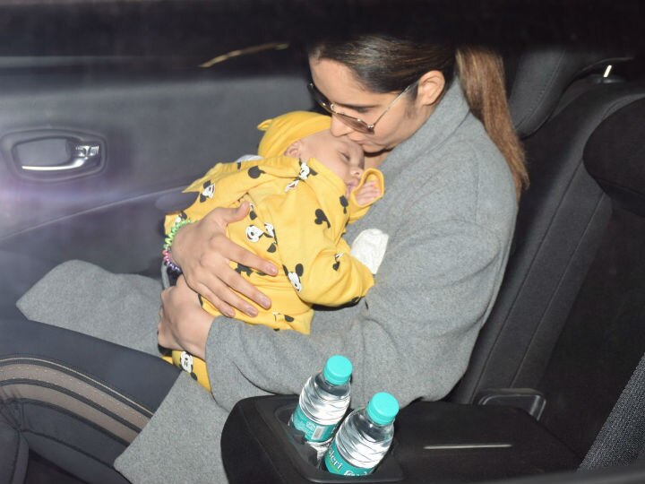 Sania Mirza clicked with baby son Izhaan Mirza Malik at the airport!  This PIC of Sania Mirza kissing her sleeping baby son Izhaan Mirza Malik will melt your hearts; MORE PHOTOS INSIDE!