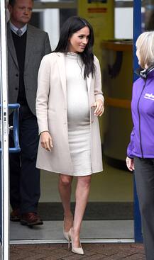IN PICTURES: Pregnant Meghan Markle flaunts baby bump as she steps out in $35 dress