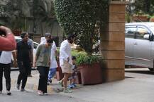 Taimur Ali Khan\'s little guitarist avatar is too Awww; Spotted on evening stroll with mom-dad Kareena and Saif!