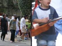 Taimur Ali Khan\'s little guitarist avatar is too Awww; Spotted on evening stroll with mom-dad Kareena and Saif!