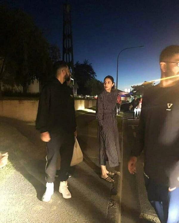 PIC: Anushka Sharma & hubby Virat Kohli spotted chatting with a little fan in New Zealand!