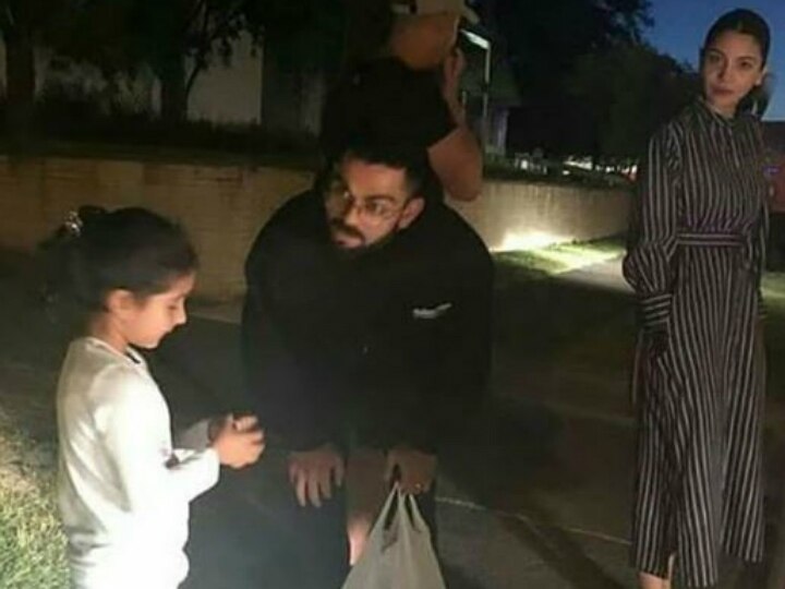 PIC: Anushka Sharma & hubby Virat Kohli spotted chatting with a little fan in New Zealand! PIC: Anushka Sharma & hubby Virat Kohli spotted chatting with a little fan in New Zealand!