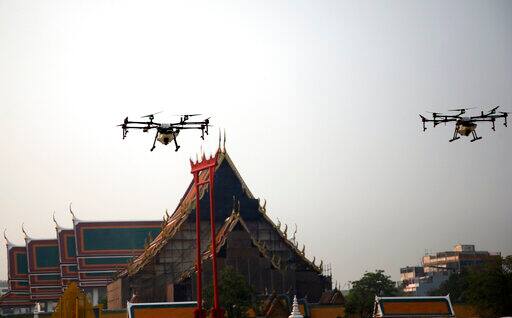 The air pollution level around Thailand’s capital Bangkok has reached alarming levels this week and in an attempt to curb the thick smog covering the city, authorities had to deploy a fleet of drones, trucks and small planes for artificial rain. (AP Photo/Sakchai Lalit)