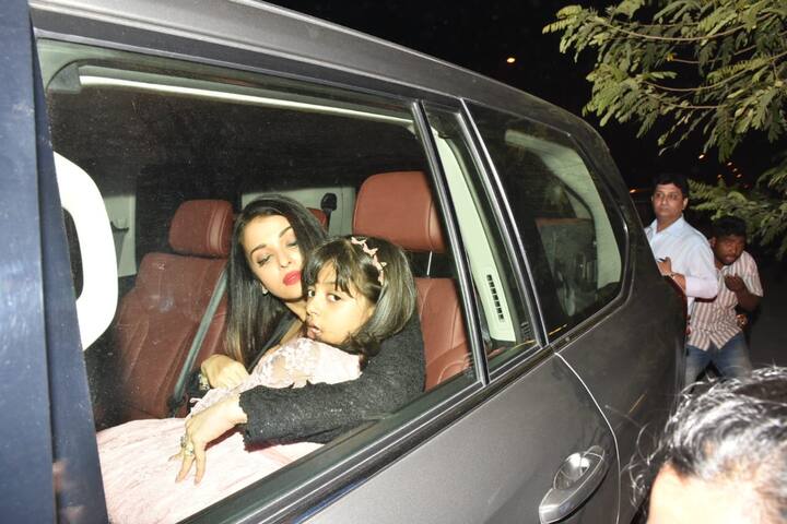 Later Aishwarya was seen cuddling her baby girl Aaradhya in their car