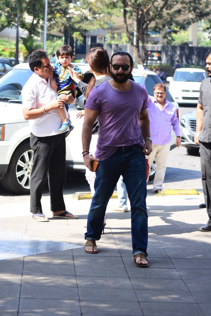 The lil one was being carried by his helper joined his parents on reaching the restaurant. 