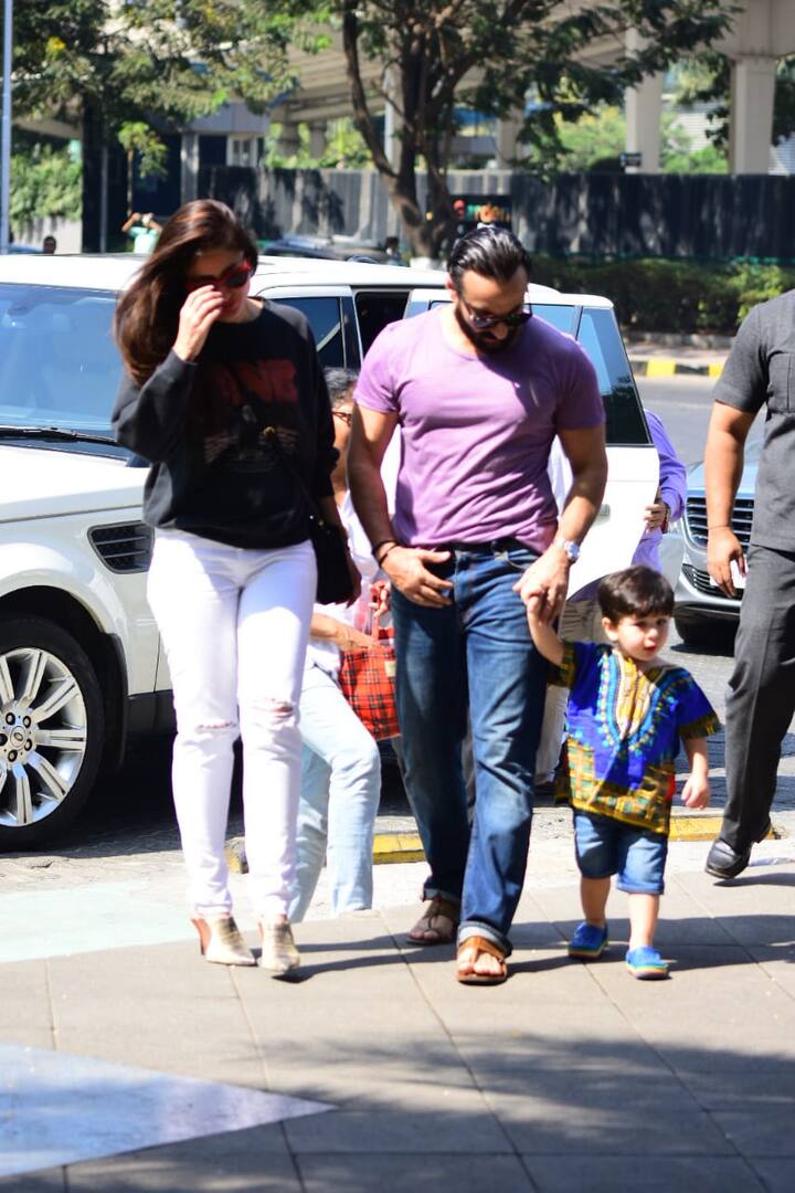 The baby gave a look to paparazzi cameras and we totally loved it.