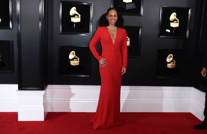 15-time Grammy award winner Alicia Keys stunned in red, she also hosted the award night (Photo by Jordan Strauss/Invision/AP)