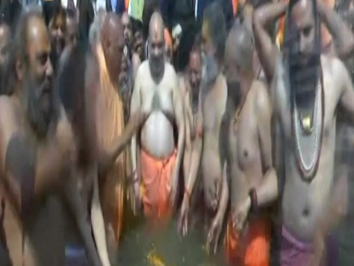 At Kumbh, BJP president Amit Shah to take dip in sangam and meet congregations of saints today At Kumbh, BJP president Amit Shah takes dip in holy Ganges at Triveni sangam