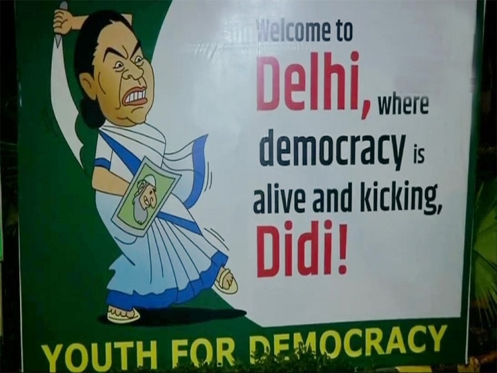 Mamata Banerjee in Delhi: Posters across national capital welcome West Bengal CM with 'democracy' jibe Mamata Banerjee in Delhi: Posters across national capital welcome West Bengal CM with 'democracy' jibe