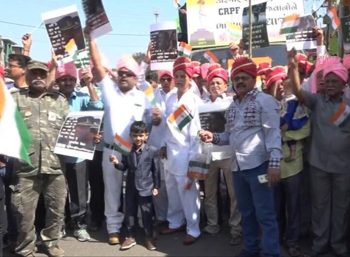 Including the bride and groom, those who attended the procession were carrying banners paying tributes to the brave hearts. ANI Photo