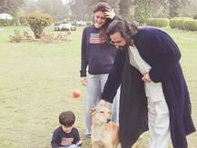 UNSEEN PIC: Taimur & Kareena twin in blue while daddy Saif plays with a dog at Pataudi Palace