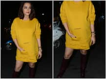 Pregnant TV actress Surveen Chawla flaunts her baby bump in a short yellow dress at an event; Check out PICS