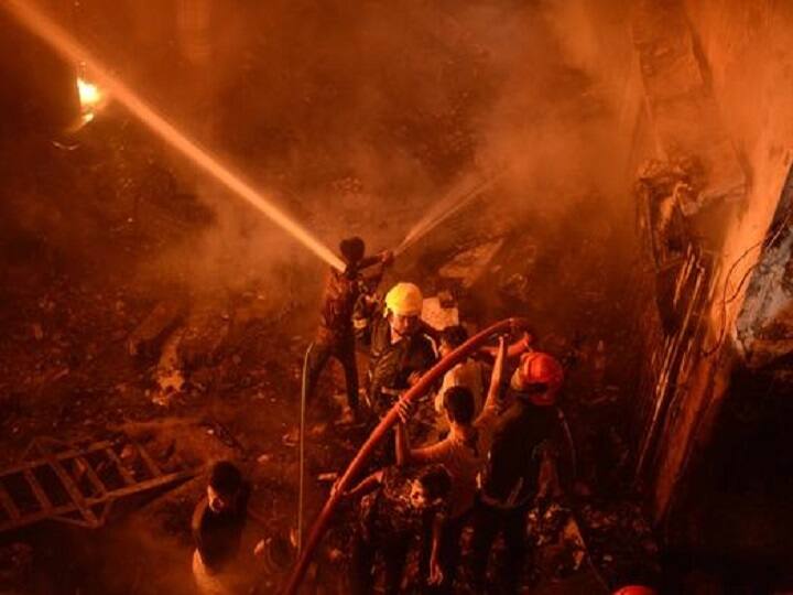 Residents in the neighbourhood said the fire broke out at a chemical store of a four-storey building in Old Dhaka's Chak Bazar area and quickly spread to four adjacent buildings. (AP Photo)