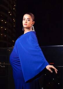 PICS: Heavily pregnant Surveen Chawla flaunts her baby bump in maternity photo shoot