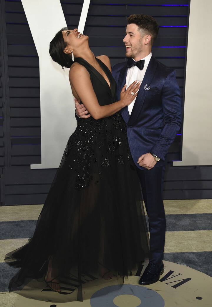 The couple looked head-over-heels in love as they gave enough PDA moments to the paparazzi (Photo by Evan Agostini/Invision/AP)