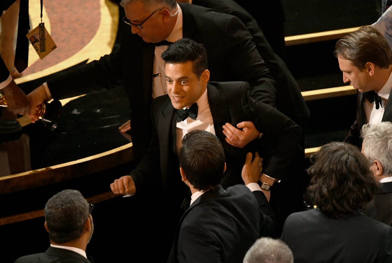 Oscars 2019: PICS! Rami Malek falls off the stage post win; Treated by Medics!
