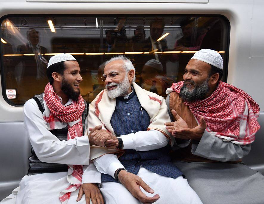 In Pictures: PM Modi Takes Delhi Metro Ride To ISKCON Event In Pictures: PM Modi Takes Delhi Metro Ride To ISKCON Event