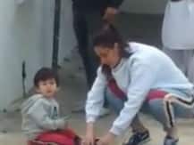 WATCH: This video of Kareena Kapoor Khan helping son Taimur Ali Khan put on his shoes proves that she is a hands-on mommy!