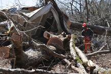 IN PICS: Houses reduced to rubble, vehicles crushed and people killed in massive US tornadoes