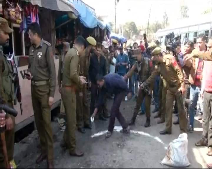 The police has cordoned off the area around the bus stand. 