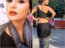 Kasautii Zindagii Kay\'s Komolika aka Hina Khan redefines HOTNESS flaunting her hourglass figure in this stylish black saree!