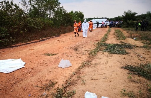 The plane reportedly carried nine passengers and three crew members, including the mayor of Taraira, a municipality located in the southeastern province of Vaupes. Authorities have launched an investigation into the causes of the accident, said the agency. (Photo by HO / COLOMBIA'S CIVIL DEFENSE PRESS OFFICE / AFP)