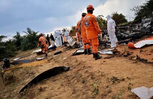 The agency said in a statement that the aircraft had declared itself in emergency shortly before crashing. (Photo by HO / COLOMBIA'S CIVIL DEFENSE PRESS OFFICE / AFP)