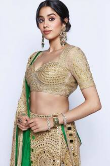 IN PICS: Janhvi Kapoor is an absolute dream in a backless choli & green mirror work lehenga!