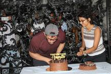 Happy Birthday Aamir Khan! FIRST PICS: Mr. Perfectionist celebrates with media; locks lip with wife after cutting cake