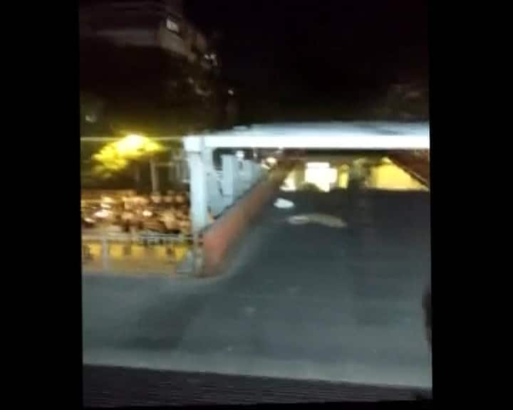 Mumbai: Foot over bridge connecting CST platform 1 north end with B T Lane near Times of India building has collapsed. / ABP NEWS GRAB