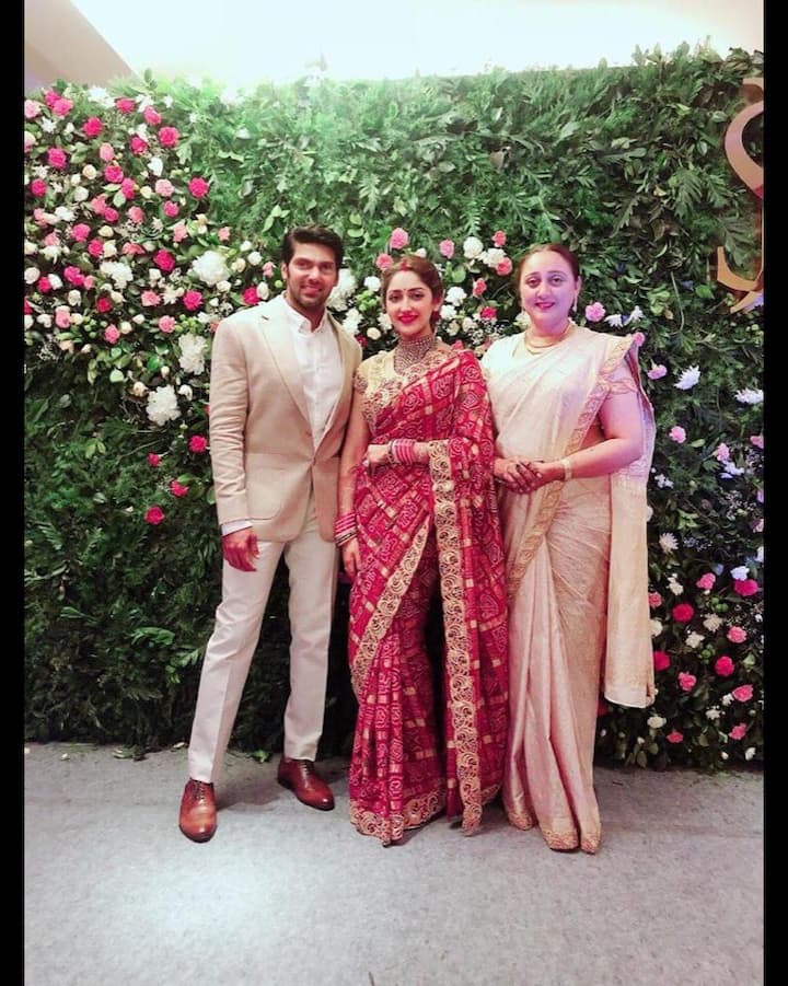 Sayyeshaa’s mother Shaheen Banu shared a picture of the newly married couple from their wedding reception on Instagram.