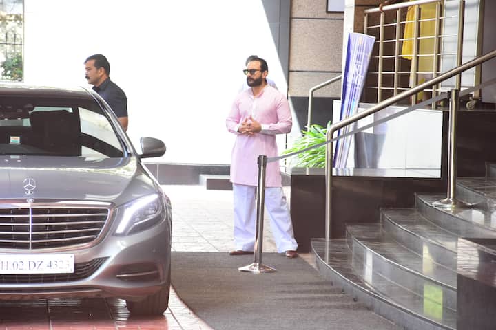 Saif was seen in a white and pastel pink kurta-pyjamas which he paired with tan shoes. His hair was neatly backcombed and his beard made him look quite hot. 