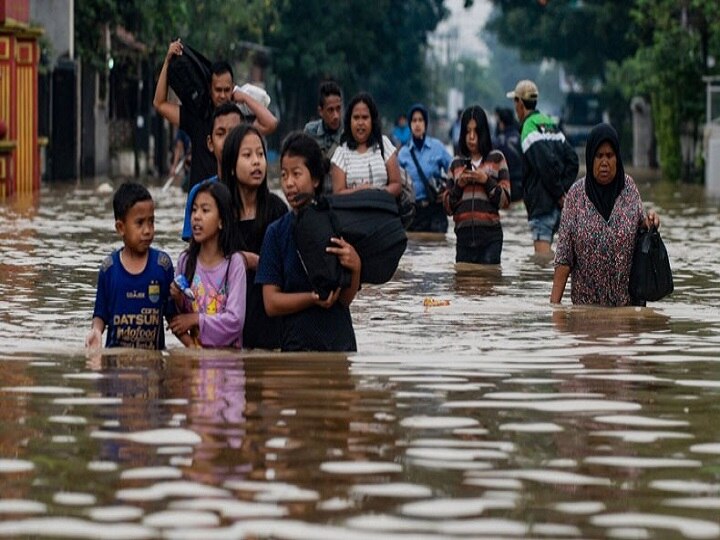 At least 50 killed by flash floods in Indonesia's Papua At least 50 killed by flash floods in Indonesia's Papua