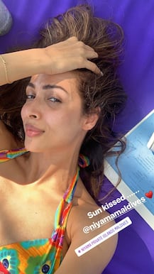 Malaika Arora dons bikini on Maldives vacation with friends! Arjun Kapoor REACTS to her pic!