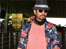 Irrfan Khan uncovers face in front of paparazzi at Mumbai airport, looks in pink of health (PICS & VIDEO)