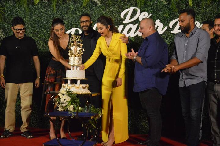 Tabu and Rakul Preet cutting the birthday cake 