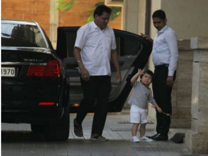 WATCH: Taimur Ali Khan gives a ROYAL WAVE to the paparazzi melting our hearts!