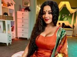 PICS: After playing beautiful mermaid, TV actress Monalisa is back in her daayan avatar; Looks elegantly HOT in orange salwar-kameez on set!