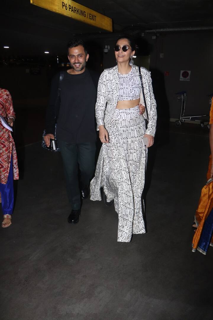 Sonam opted for a chic white co-ord set that had black prints all over.The Bollywood diva flaunted her washboard abs 