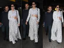 PHOTOS: Ahem! Anand Ahuja can\'t keep his hands off wife Sonam Kapoor as they arrive at Mumbai airport!