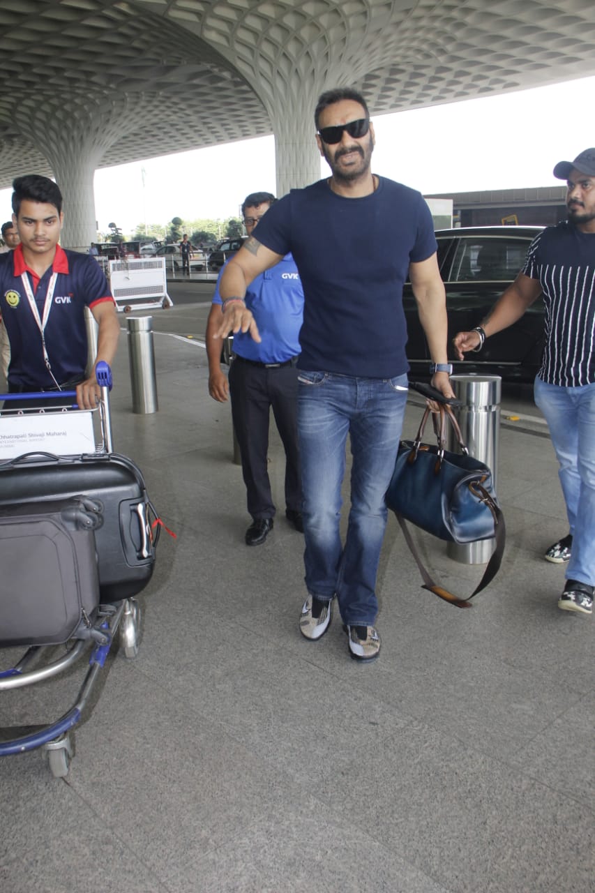 Watch: Ajay Devgn's little son Yug gets irritated by Paparazzi lights at Mumbai airport; SEE PICS & VIDEO