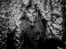 Akash Ambani\'s bride Shloka Mehta looks resplendent as she walks down the aisle on her wedding day in this UNSEEN PIC