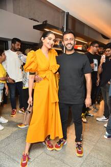 Anand Ahuja ties shoe laces for Sonam Kapoor, \