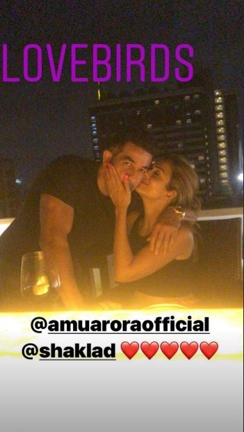 AHEM! Actress Amrita Arora locks lips with hubby at her terrace party with Kareena Kapoor & her girl gang!