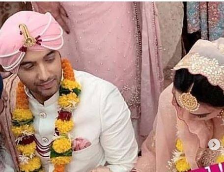 Ssharad looked dapper in a pearl white sherwani while his bride Ripci looked beautiful in a pink lehenga. (Source- Instagram)