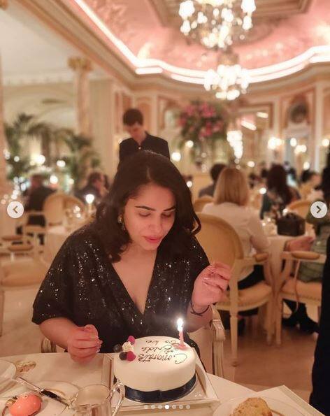 Ishita can be seen blowing the candle on the cake in this photo. She wore a black outfit for her bridal shower and looked stunning.